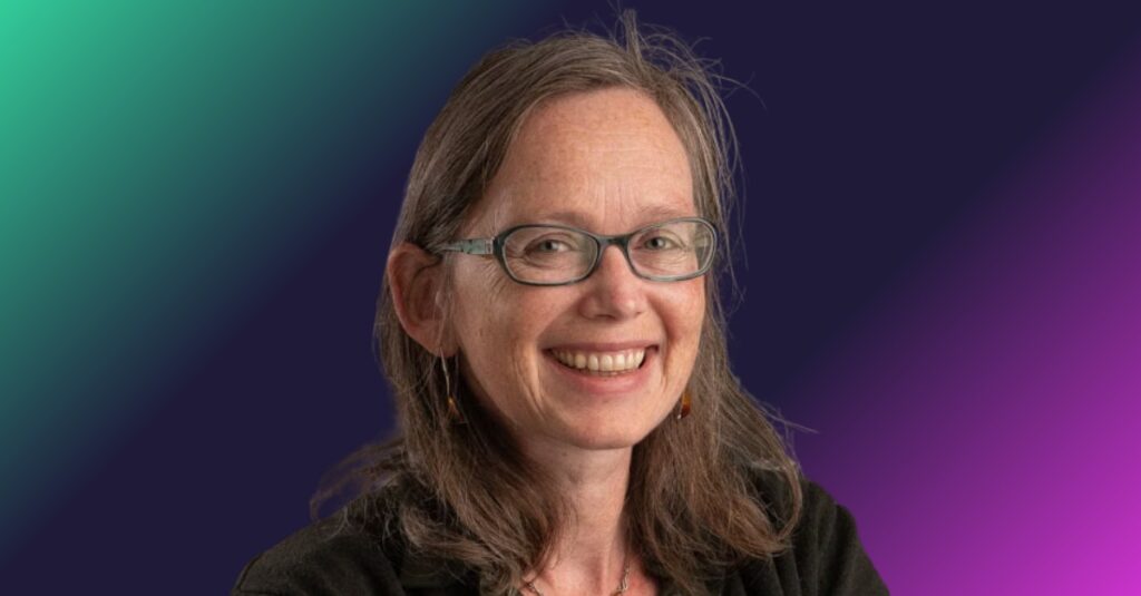 Dr. Rozalyn Anderson, expert in metabolism and aging, headshot with glasses in a lab setting