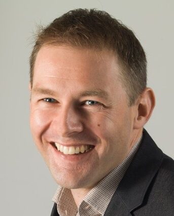 Enej Kuščer, Founder of Nu, smiling in a professional headshot